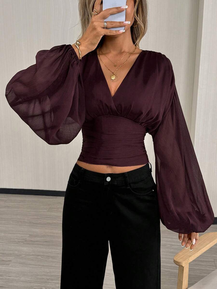 Vintage Mesh Lantern Sleeve Top – Stylish Elegance with Backless & Bow Detail