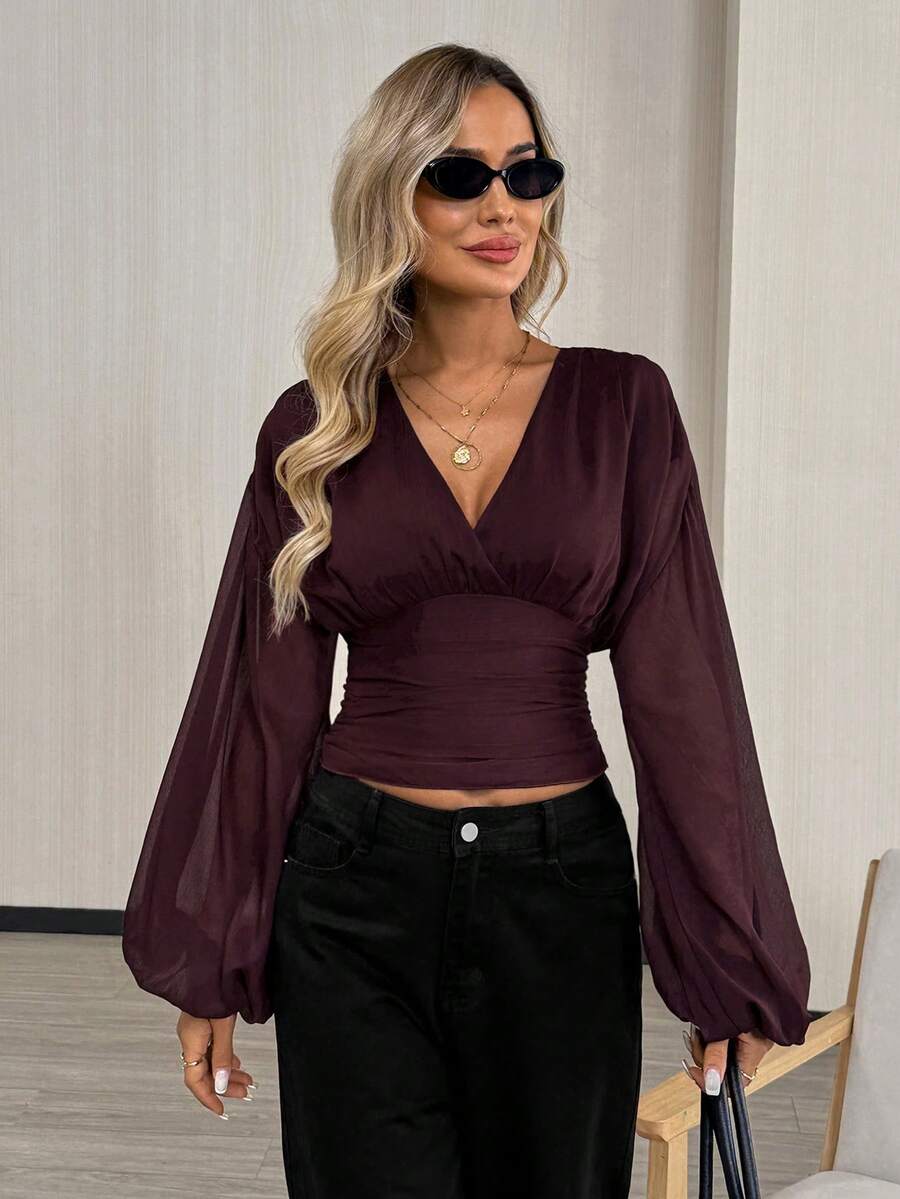 Vintage Mesh Lantern Sleeve Top – Stylish Elegance with Backless & Bow Detail